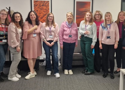 Procurement services team wearing pink supporting breast cancer