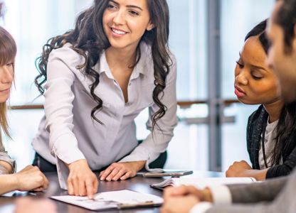 A corporate setting with colleagues in a meeting