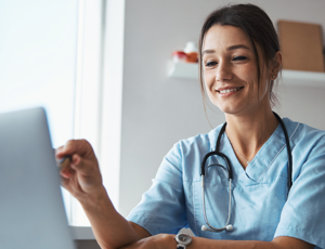  A person looking at their laptop