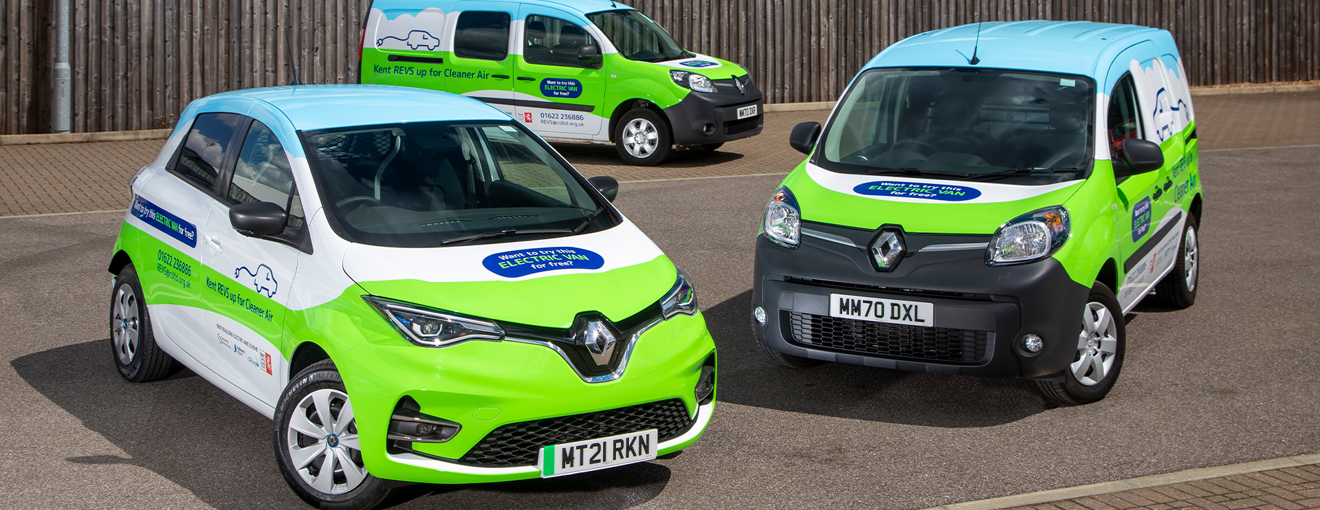 Three branded Renault vehicles in a car park