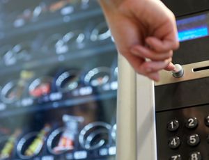 A person using a vending machine