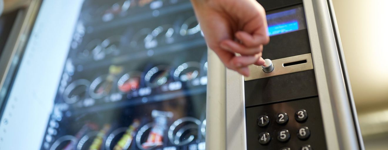 A person using a vending machine