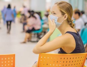 A patient waiting in a hospital waiting area
