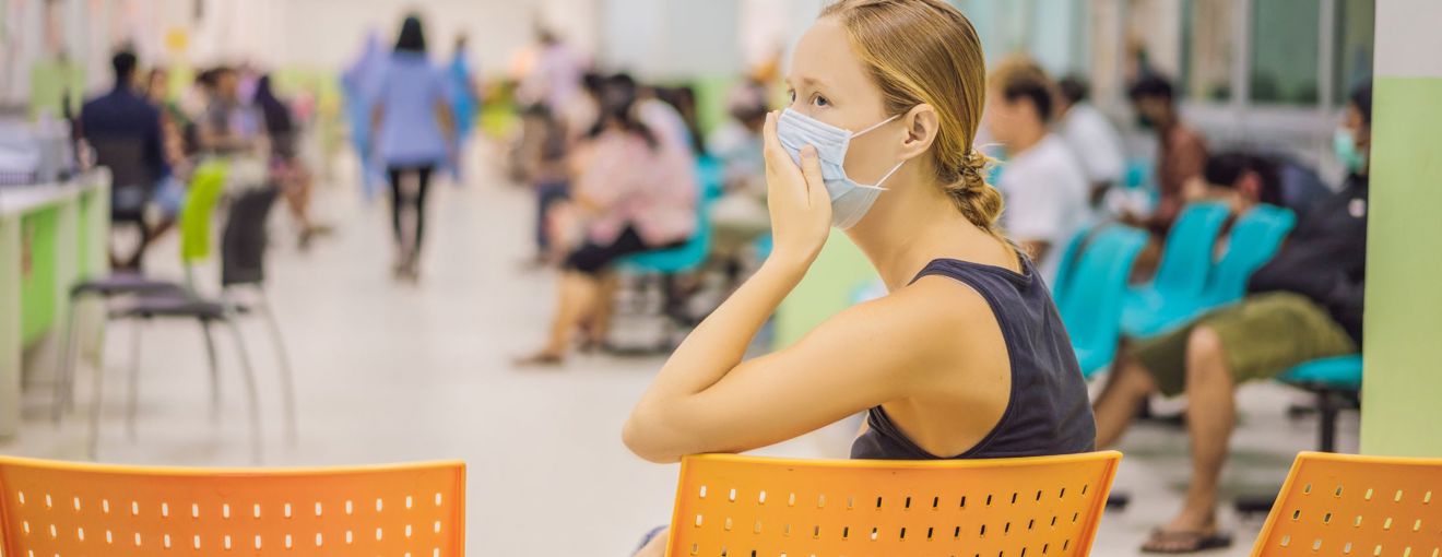 A patient waiting in a hospital waiting area