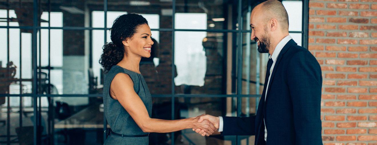 Handshake in a corporate setting