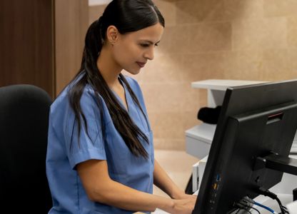 Hospital worker using a computer