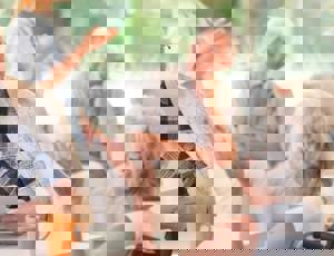 Care home residents having a conversation in a communal space