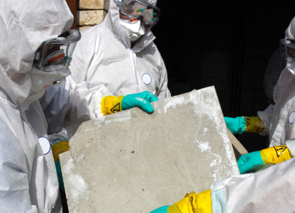 A group of people in PPE 